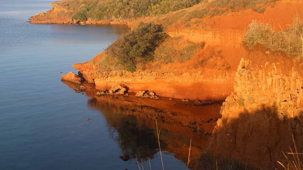 Reflection of rocks in the sea